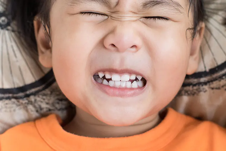 how-stop-child-grinding-teeth-bruxism